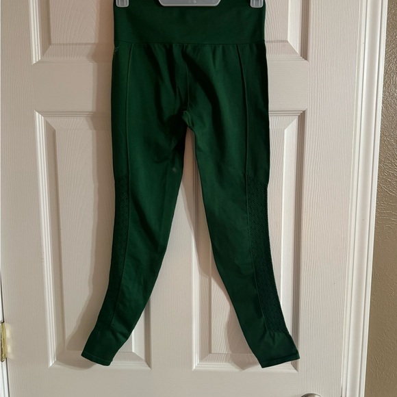 Fabletics Green Crop Yoga Pants with cut out detail on legs - Picture 3 of 4
